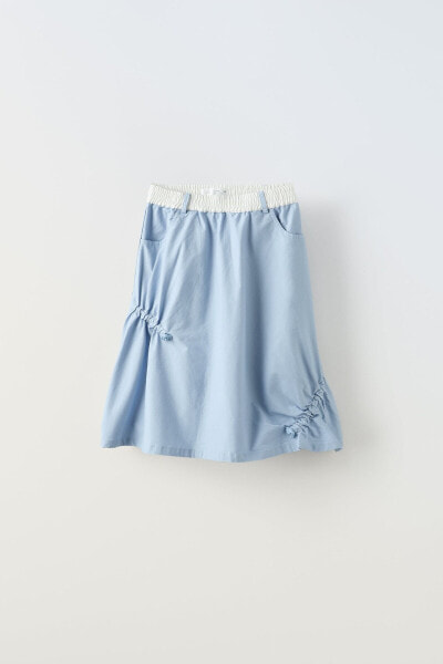 Technical skirt with stoppers