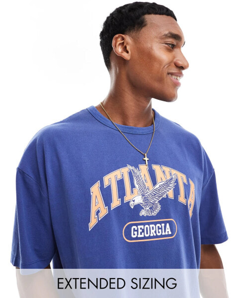 ASOS DESIGN oversized t-shirt in washed blue with front city print