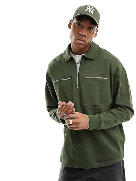 ASOS DESIGN oversized half zip sweatshirt with pockets in dark green