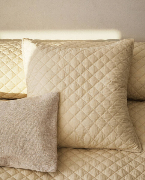 Diamond quilted cushion cover