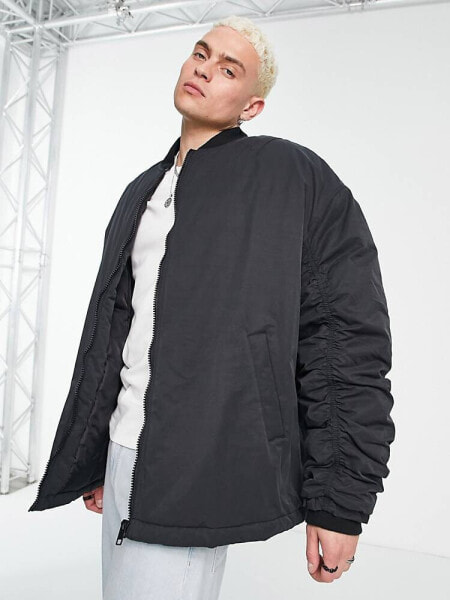 ASOS DESIGN extreme oversized wadded bomber jacket in black