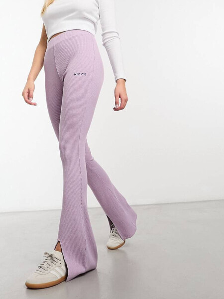 Nicce juno flared leggings in light pink with split hem