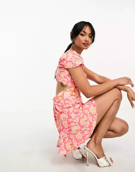 French Connection flutter sleeve playsuit in pink floral