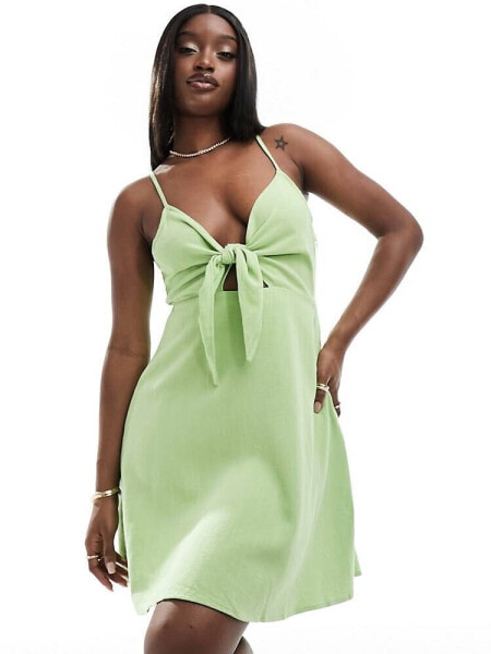 NA-KD tie front mini dress in green