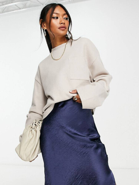 ASOS DESIGN super soft oversized jumper with pocket detail in warm cream