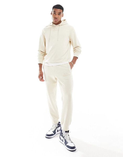 Armani Exchange logo sweat joggers in beige CO-ORD