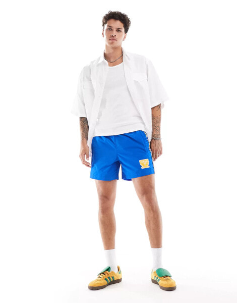 adidas Originals GRFX shorts in blue