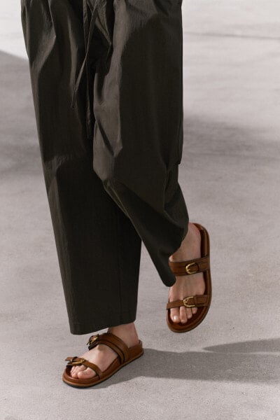 Sandals with buckles