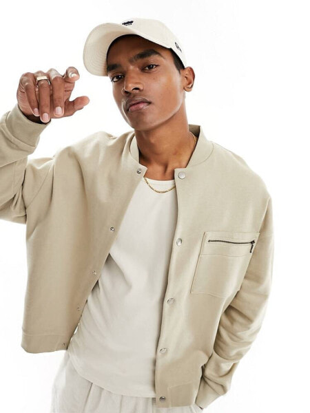 ASOS DESIGN smart bomber jersey jacket with pocket in beige 