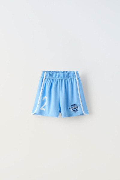 Embroidered football bermuda shorts