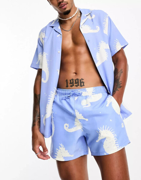 ASOS DESIGN co-ord swim shorts in short length in seahorse print