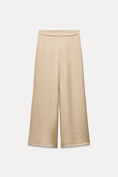 CREASED-EFFECT PALAZZO TROUSERS