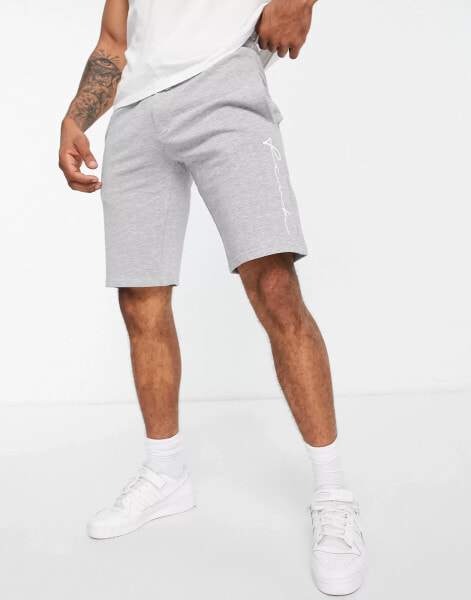 FCUK side scribble jersey shorts in light grey