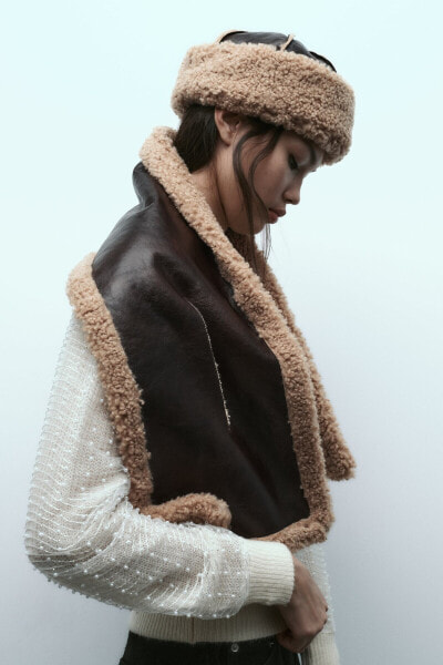 Double-faced faux shearling hat