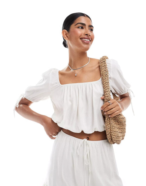 ASOS DESIGN gathered neckline puff sleeve blouse in ivory