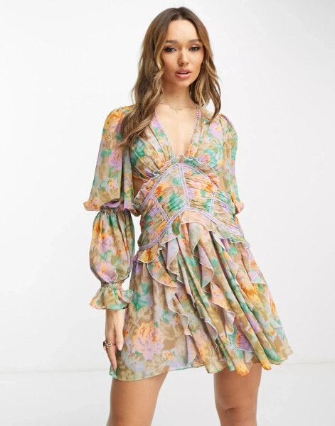 ASOS DESIGN ruched waist plunge mini dress with ruffle skirt and open back detail in blurred floral print