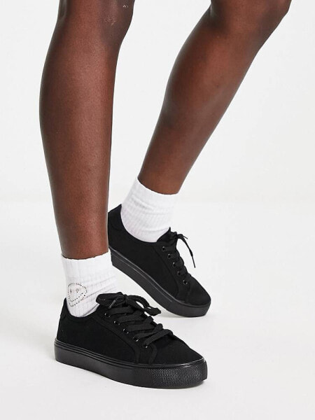 ASOS DESIGN Dizzy lace up trainers in black drench