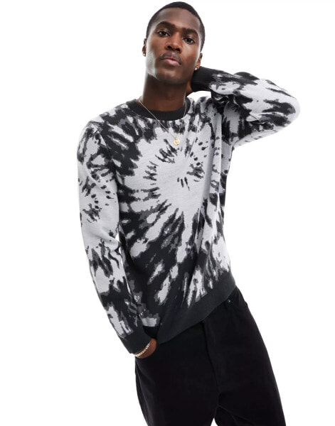 ASOS DESIGN relaxed knitted jumper in black with tie dye pattern