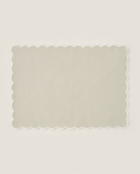 Scalloped cotton and linen placemat