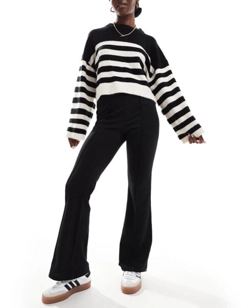 Vila pleat front jersey flared trousers in black