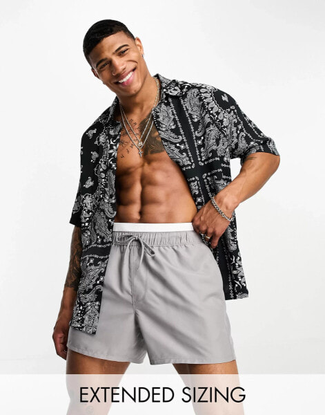 ASOS DESIGN swim shorts in short length in grey