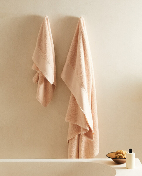 Cotton towel with linen border