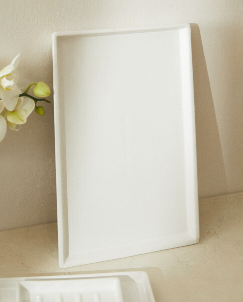 White earthenware bathroom tray