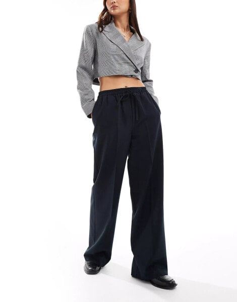 ASOS DESIGN tailored pull on trousers in navy