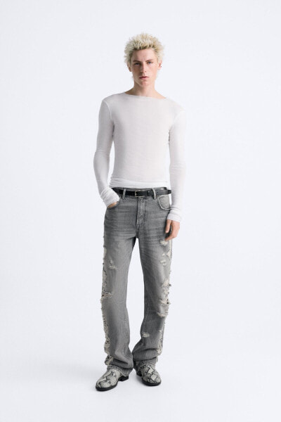 Jeans with ripped-effect sides