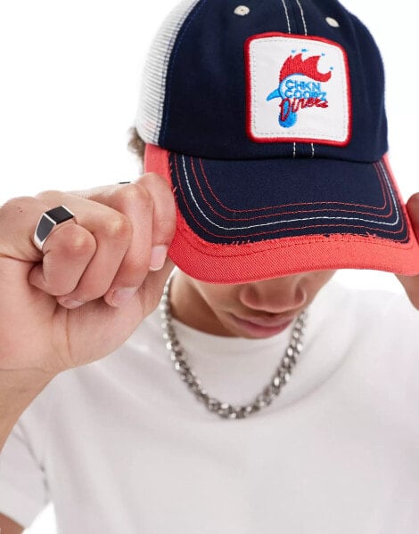 ASOS DESIGN trucker cap with fried chicken graphic in navy and red