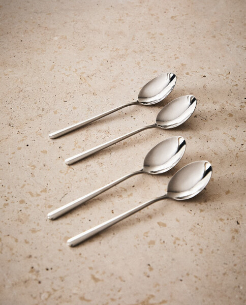 Set of shiny steel dessert spoons