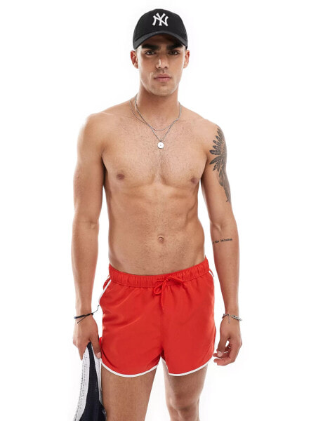 ASOS DESIGN runner swim shorts in short length in red