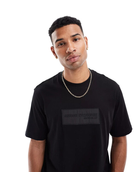 Armani Exchange t-shirt in black with raised chest logo