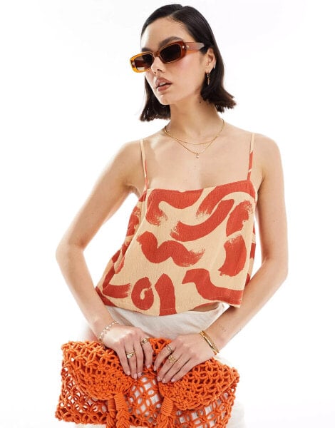 ASOS DESIGN crinkle linen look square neck cami top in orange swirl print