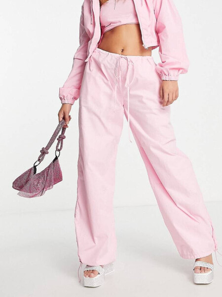 ASOS DESIGN parachute cargo trousers in pink co-ord