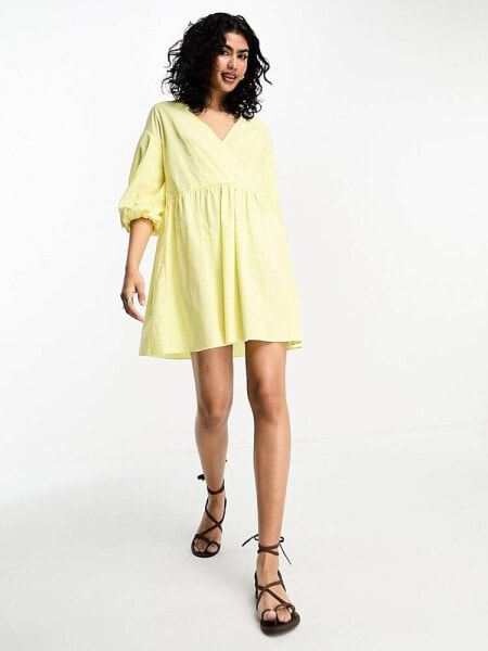 River Island puff sleeve tie back smock mini dress in yellow