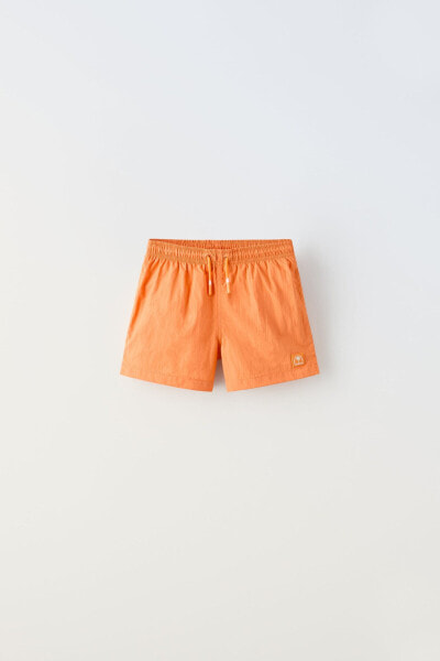 6-14 years/ plain swim shorts with label