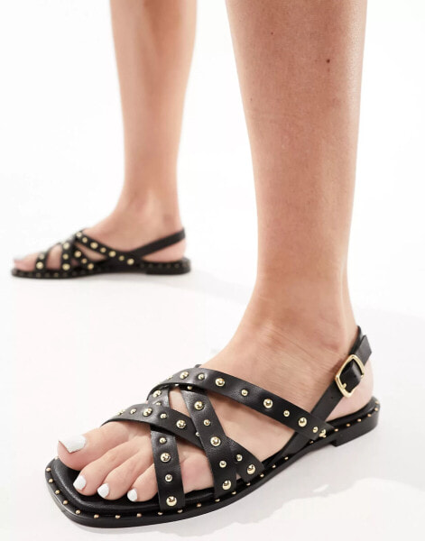 schuh Thelma slingback studded sandals in black leather