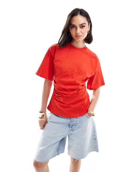 ASOS DESIGN corset waist t-shirt with embroidered hamptons graphic in red