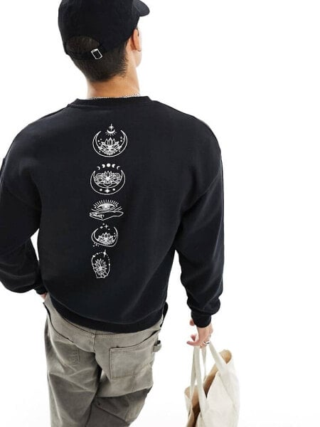 Jack & Jones oversized sweat with celestial spine back print in black 