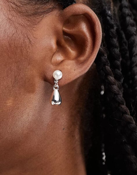 True Decadence pearl teardrop studs with silver detail