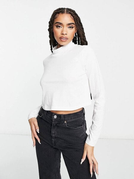 The North Face Nekku high neck cropped long sleeve top in white Exclusive at ASOS
