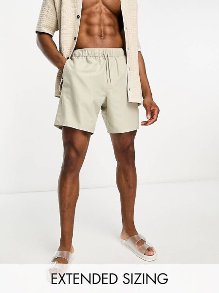 ASOS DESIGN swim shorts in mid length in ecru