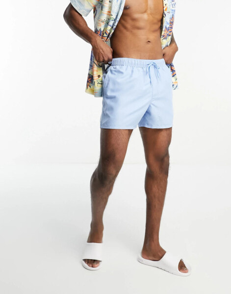 ASOS DESIGN swim shorts in short length in light blue