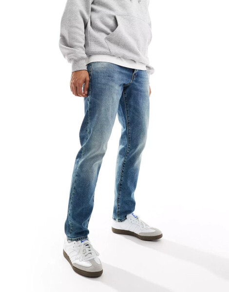 G-star 3301 regular tapered denim jeans in midwash blue