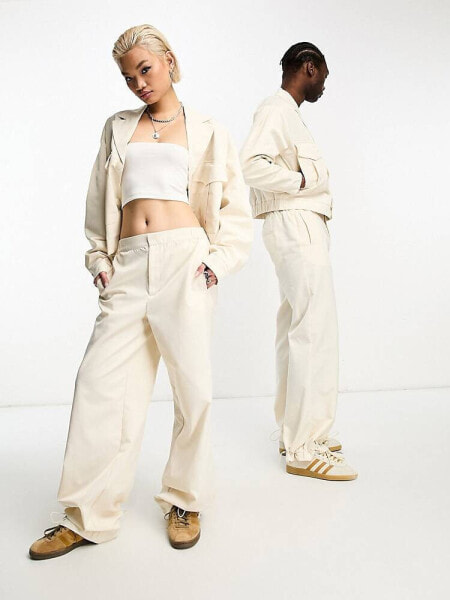 IIQUAL unisex parachute trousers co-ord in cream