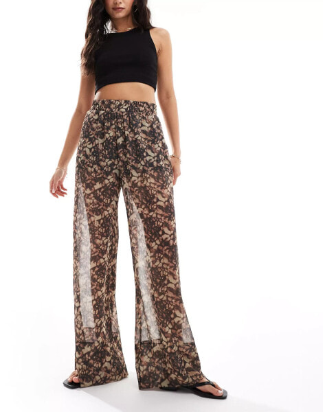 ASOS DESIGN pull on trouser with sheer overlay in abstract print