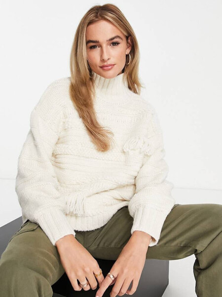 ASOS DESIGN high neck jumper in mixed texture with tassels in cream