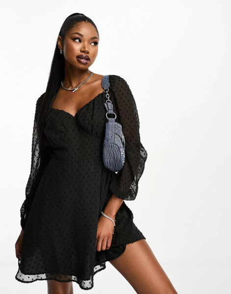 I Saw It First sweetheart neckline mini skater dress in black spot print