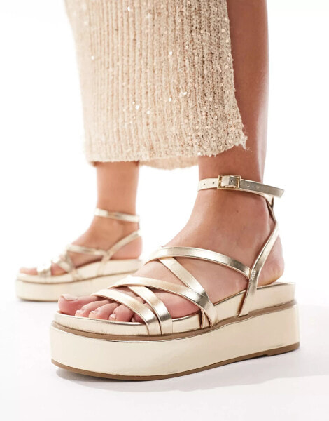 ASOS DESIGN Taurus 2 strappy flatform sandals in gold